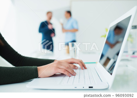 Girl works on a laptop. Concept of internet sharing and interconnection 96093092
