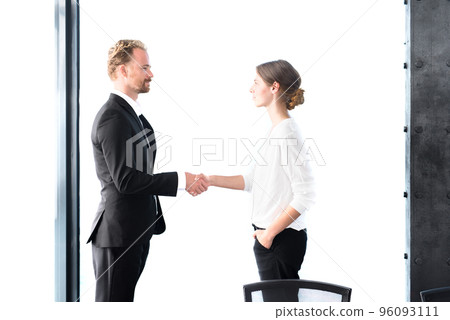 Business handshake. Concept of teamwork and partnership 96093111