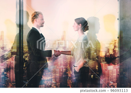Handshake of two businessperson in office concept of partnership and teamwork 96093113