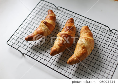 Homemade delicious croissants Homemade delicious croissants 96093134