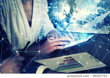 Businessperson in office connected on internet network with tablet. concept of partnership and teamwork Businessperson in office connected on internet network with tablet. concept of partnership and teamwork 96093743