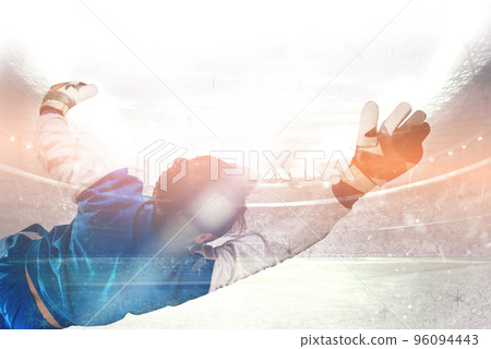 Diving goalkeeper n the stadium Diving goalkeeper n the stadium 96094443