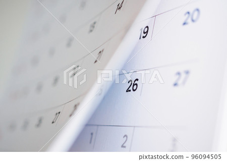calendar page flipping sheet close up background 96094505