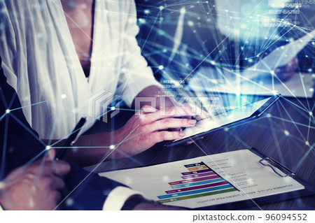 Businessperson in office connected on internet network with tablet. concept of partnership and teamwork Businessperson in office connected on internet network with tablet. concept of partnership and teamwork 96094552