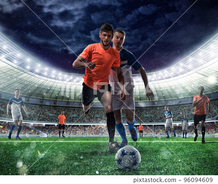 Football scene with competing football players at the stadium Football scene with competing football players at the stadium 96094609