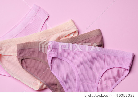 Women's panties on pink background with copy space Women's panties on pink background with copy space 96095055