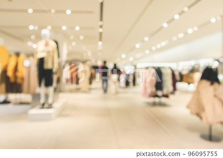 Abstract blur clothing boutique store display interior of shopping mall background Abstract blur clothing boutique store display interior of shopping mall background 96095755