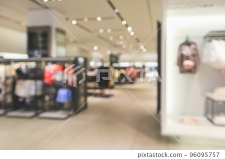 Abstract blur clothing boutique store display interior of shopping mall background Abstract blur clothing boutique store display interior of shopping mall background 96095757