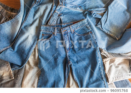 many denim blue jeans background 96095768