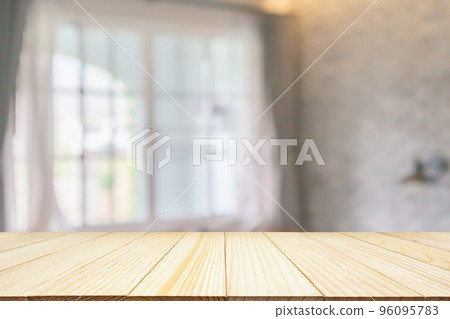 Empty wood table top on hotel resort living room interior design with large windows abstract blur background for product display Empty wood table top on hotel resort living room interior design with large windows abstract blur background for product display 96095783