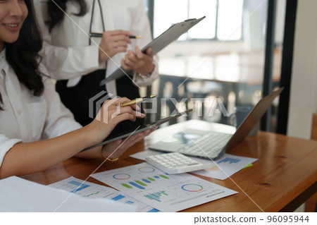 Group of business consultant working management big data and analyze financial document of company. account, finance, business concept 96095944