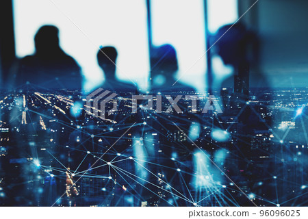 Blurred silhouette of businessperson in office with network effect. concept of partnership and teamwork Blurred silhouette of businessperson in office with network effect. concept of partnership and teamwork 96096025
