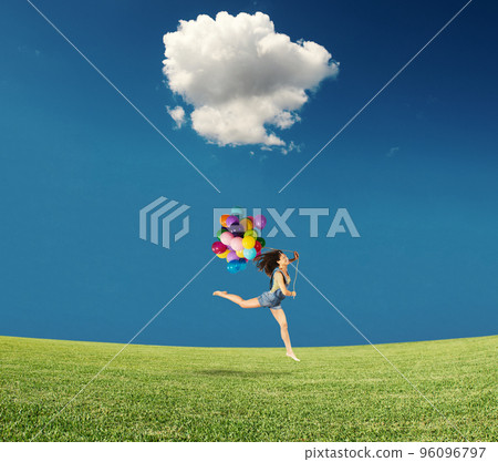 Jumping with balloons Jumping with balloons 96096797