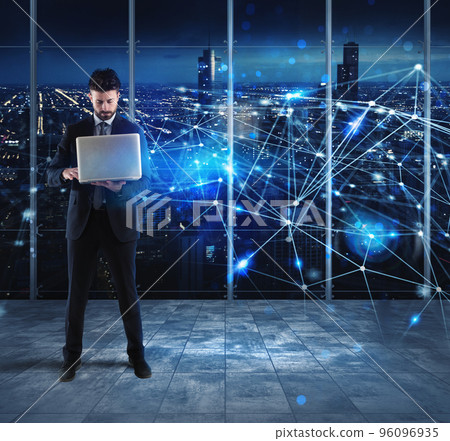 Businessman works with laptop and internet network 96096935