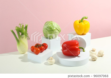 Vegetables on stands on two tone background Vegetables on stands on two tone background 96097068