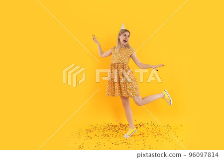 Concept of Happy Birthday with attractive girl on yellow background 96097814