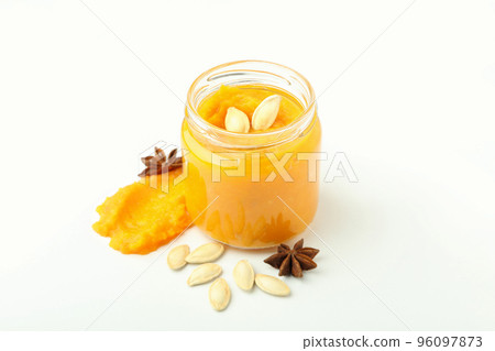 Pumpkin jam on white background, close up Pumpkin jam on white background, close up 96097873
