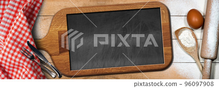 Baking Ingredients and Empty Blackboard with Copy Space Baking Ingredients and Empty Blackboard with Copy Space 96097908