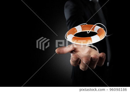 Businessman that hold a lifebelt. Concept of insurance and help in your business 96098186