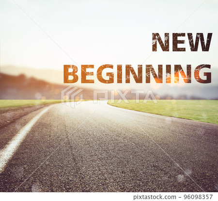 Road disappears from the view at sunset. Text new beginning 96098357