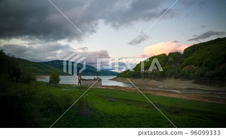 sunset Landscape of Mavrovo national park with mountain,lake and old ruined church, FYR Macedonia 96099333