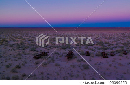 Panorama of ship cemetery at sunset near Moynaq, Karakalpakstan, Uzbekistan 96099353
