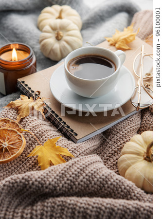 White pumpkins, coffee and autumn leaves 96100001