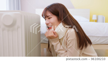 woman feel cold at home woman feel cold at home 96100210