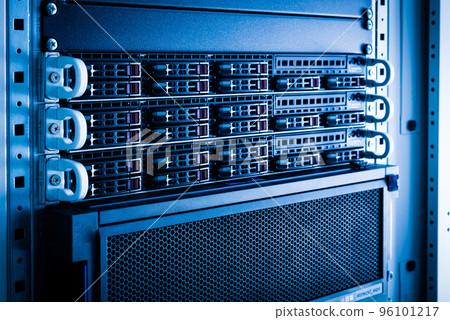 Row of hard drives serving as data storage inside server room Row of hard drives serving as data storage inside server room 96101217