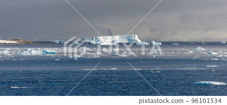 Antarctic landscape with iceberg at sea Antarctic landscape with iceberg at sea 96101534