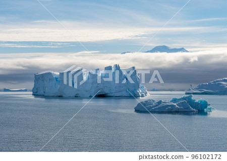 Antarctic landscape with iceberg at sea Antarctic landscape with iceberg at sea 96102172