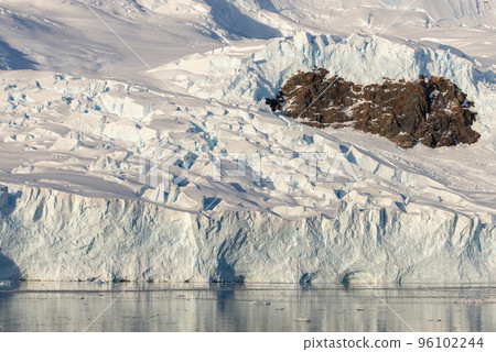 Antarctic landscape with glacier and mountains Antarctic landscape with glacier and mountains 96102244