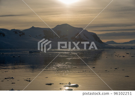 Antarctic seascape with iceberg and reflection Antarctic seascape with iceberg and reflection 96102251