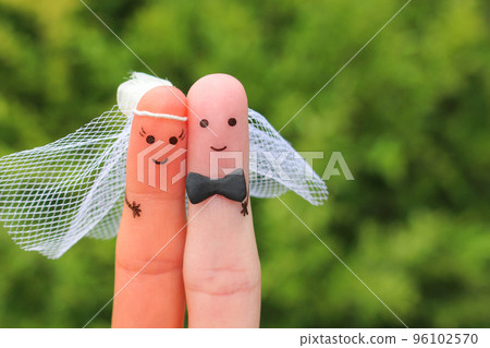 Fingers art of happy couple to get married. Concept of wedding ceremony mixed race couple. 96102570