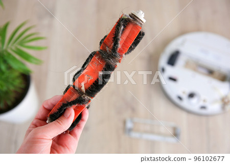A dirty brush for a robot vacuum cleaner. A dirty brush for a robot vacuum cleaner. 96102677