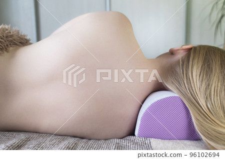 Concept photo. Orthopedic pillow. Vertebral alignment. Improving the quality of sleep due to the use of the right rest products. Correct spine position 96102694
