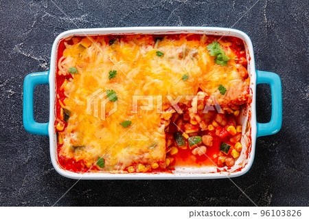 enchilada casserole with veggies, corn, pinto bean enchilada casserole with veggies, corn, pinto bean 96103826
