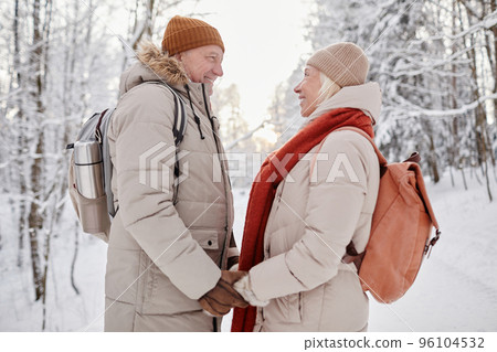 Senior Couple Hiking in Winter Senior Couple Hiking in Winter 96104532