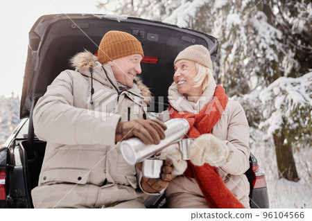 Senior Couple Enjoying Winter Getaway 96104566