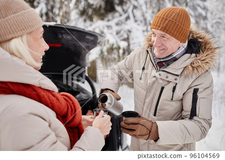 Senior Couple Drinking Hot Tea in Winter 96104569