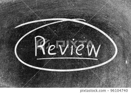 White chalk hand writing in word review on blackboard background White chalk hand writing in word review on blackboard background 96104740