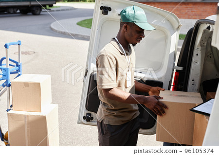 Delivery Man Unloading Truck Delivery Man Unloading Truck 96105374