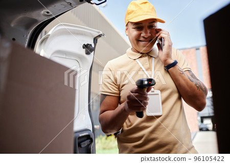 Delivery Worker Speaking by Smartphone 96105422