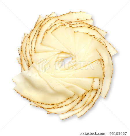 Spiral, made of tranches of French sliced pepper cheese, from above. Extra fine sliced soft cheese, with a covering of a mix of three different peppercorns, with white, green and black pepper. Photo. 96105467