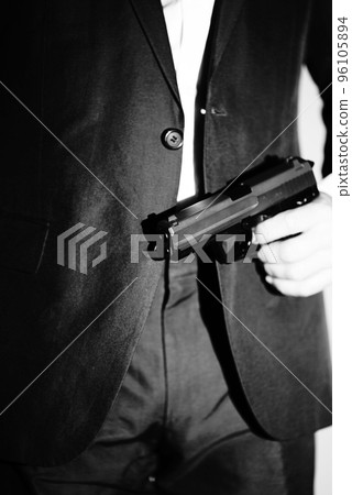 Pistol gun dark at night 96105894