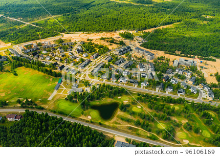 Top view of the golf course located in a wooded area 96106169