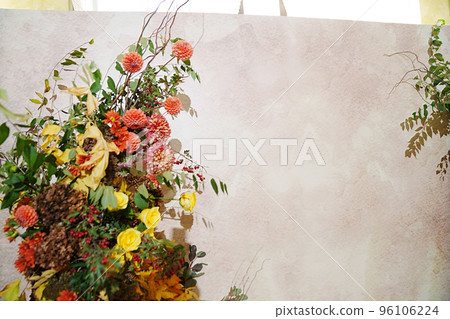 photo zone with artificial flowers in a restaurant or house.  96106224
