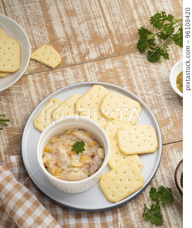 Tuna salad with butter cracker on a plate,snack food Tuna salad with butter cracker on a plate,snack food 96108420