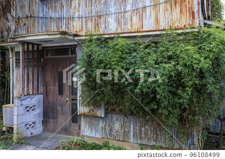 An abandoned house in the city An abandoned house in the city 96108499