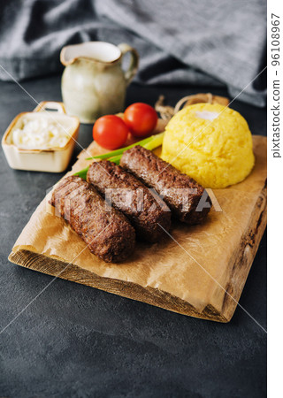 Traditional romanian grilled dish - mici or mititei 96108967
